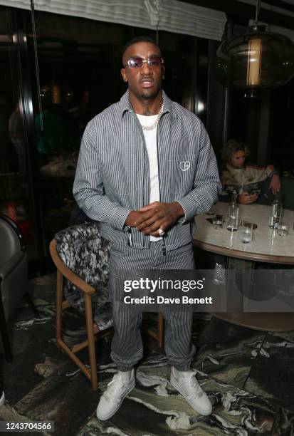 Bugzy Malone attends the red carpet launch party for the Eubank Jr vs. Benn fight week at Outernet London on October 3, 2022 in London, England.