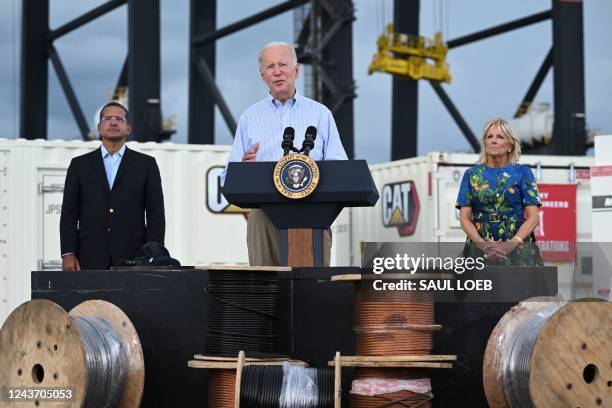 President Joe Biden, flanked by US First Lady Jill Biden and Puerto Rico Governor Pedro Pierluisi, delivers remarks in the aftermath of Hurricane...