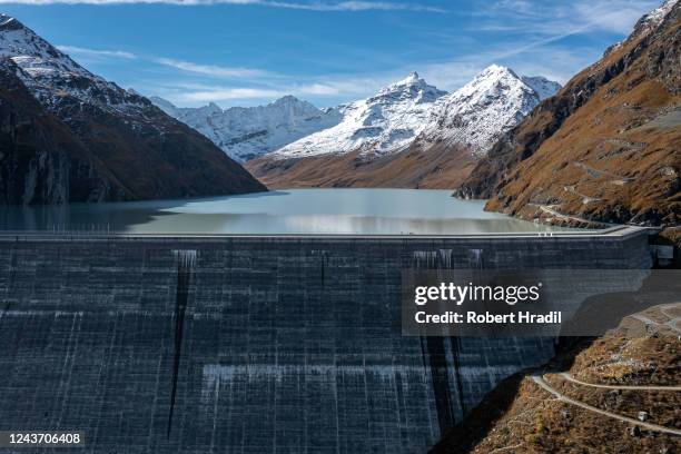 In this aerial view the Grande Dixence dam stands on October 3, 2022 near Heremence, Switzerland. The dam, which at 285 meters is the tallest in...