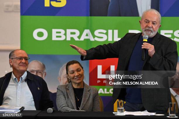 Brazilian former President and candidate for the leftist Workers Party Luiz Inacio Lula da Silva, speaks next to his wife Rosangela "Janja" da Silva,...