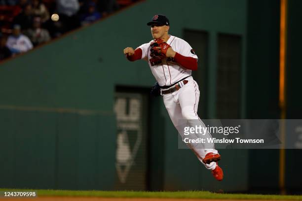 Enrique Hernandez of the Boston Red Sox throws out Randy Arozarena of the Tampa Bay Rays during the fourth inning at Fenway Park on October 3, 2022...