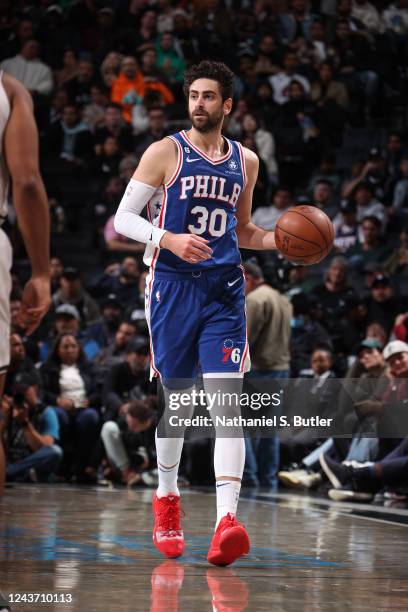 Furkan Korkmaz of the Philadelphia 76ers dribbles the ball against the Brooklyn Nets during a preseason game on October 3, 2022 at Barclays Center in...