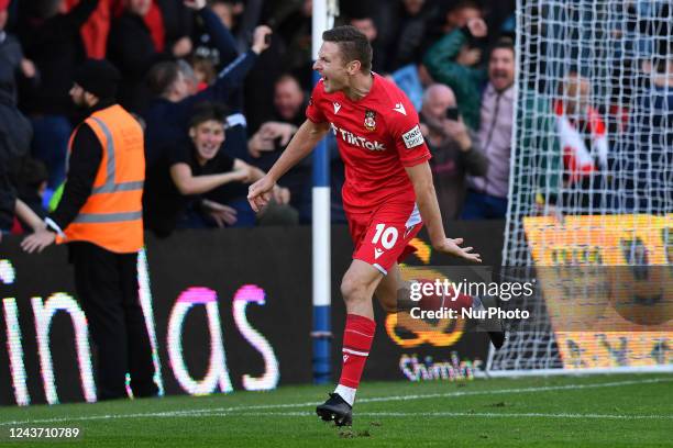 Paul Mullin of Wrexham Football Club celebrates scoring his side's second goal of the game during the Vanarama National League match between Oldham...