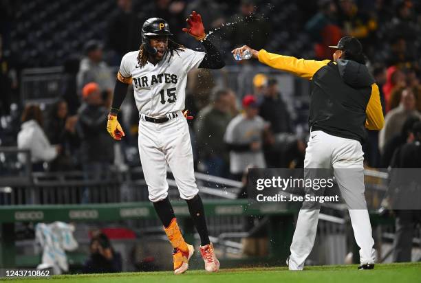 Oneil Cruz of the Pittsburgh Pirates celebrates after his walk-off walk during the ninth inning against the St. Louis Cardinals at PNC Park on...