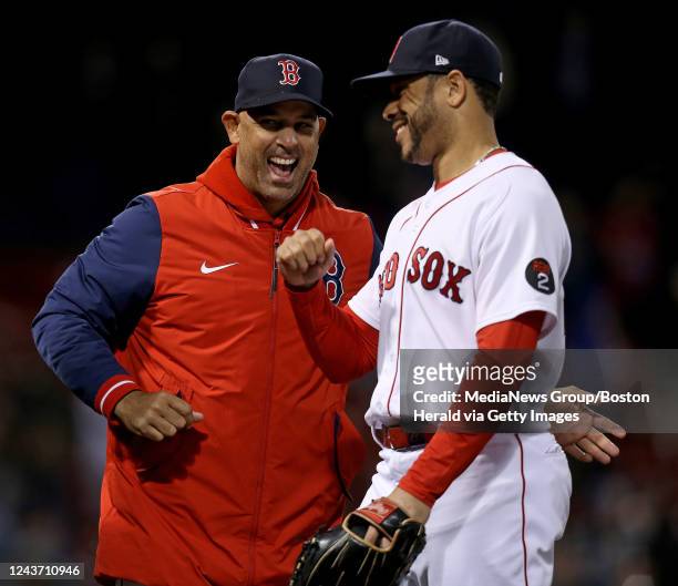 October 3: Red Sox manager Alex Cora celebrates with Tommy Pham after their 4-3 win during the ninth inning of the MLB game against the Tampa Bay...