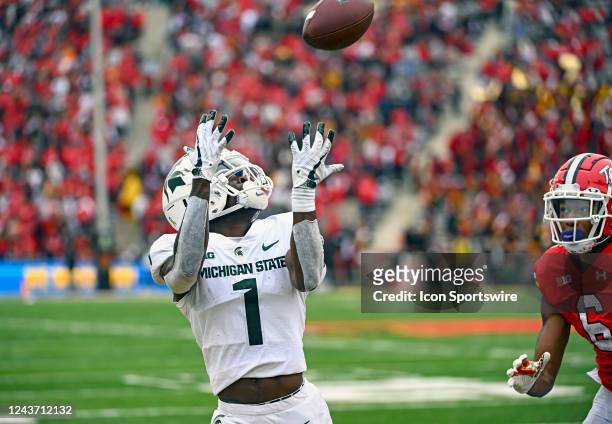 Michigan State Spartans wide receiver Jayden Reed pulls in a touchdown reception against Maryland Terrapins defensive back Corey Coley Jr. During the...