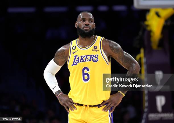 LeBron James of the Los Angeles Lakers looks on during a break in the action during the first half with Sacramento Kings at Crypto.com Arena on...