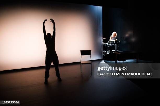 French actress Ludivine Sagnier performs on stage next to musician Pierre Belleville, during the run-through of the play "Le Consentement", in "Le...