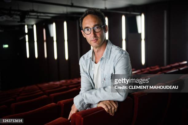 French director Sebastien Davis poses after the performance of the run-through of the play "Le Consentement", in "Le Theatre de la Libertee", in...
