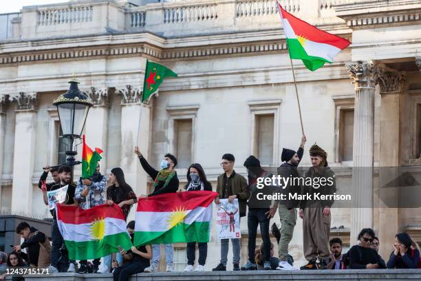 People waving Iranian and Kurdish flags fill Trafalgar Square in solidarity with those protesting across Iran on 1 October 2022 in London, United...