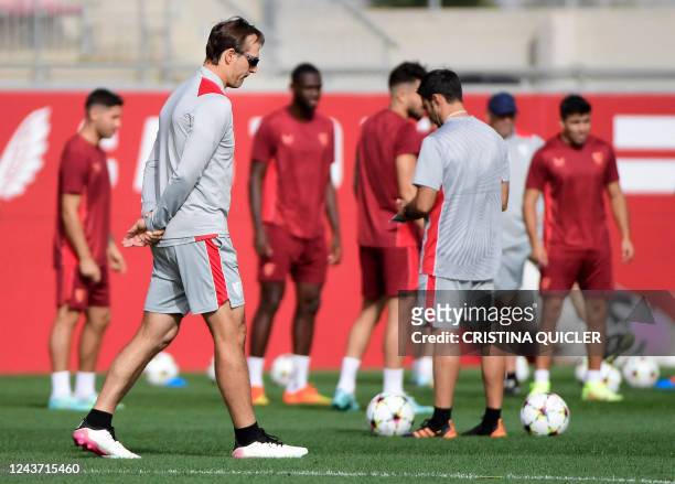 Sevilla's Spanish coach Julen Lopetegui attends a training session on the eve of their UEFA Champions League 1st round day 3 group G football match...