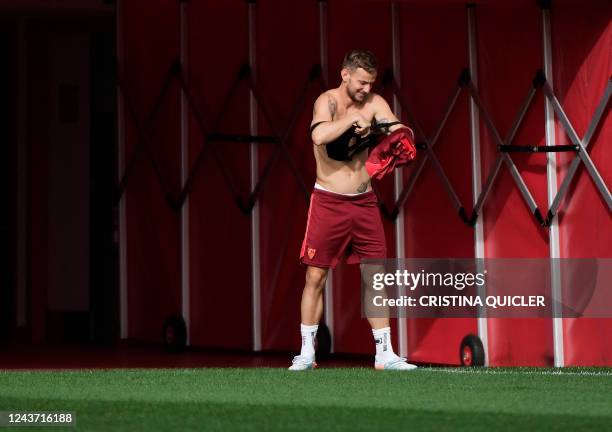 Sevilla's Croatian midfielder Ivan Rakitic attends a training session on the eve of their UEFA Champions League 1st round day 3 group G football...