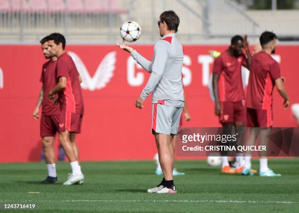 Sevilla's Spanish coach Julen Lopetegui attends a training session on the eve of their UEFA Champions League 1st round day 3 group G football match...