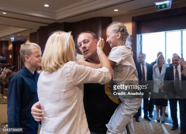 Commanders of Ukraine's Azov Battalion meet with their families during Ukraineâs first lady Olena Zelenska's meeting ommanders, which will remain in...