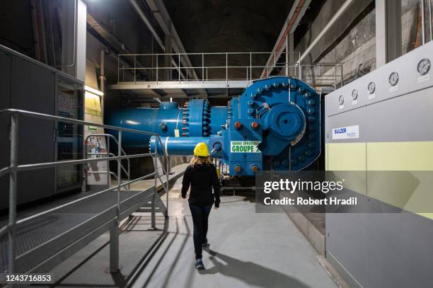 View of turbine of Bieudron Hydroelectric Power Station on October 3, 2022 near Heremence, Switzerland. Turbines for generating electricity stand in...