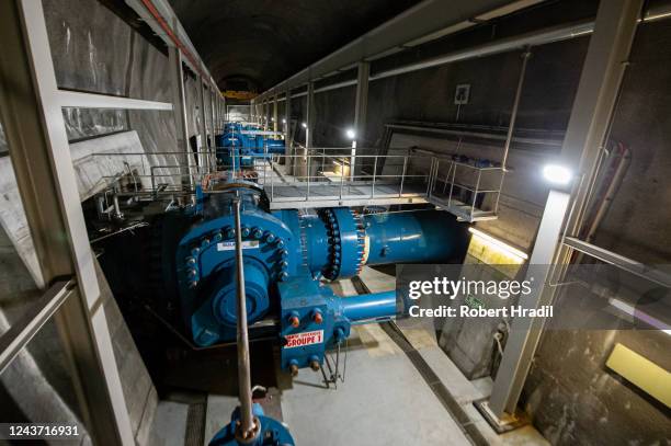 View of turbines at Bieudron Hydroelectric Power Station on October 3, 2022 near Heremence, Switzerland. Turbines for generating electricity stand in...