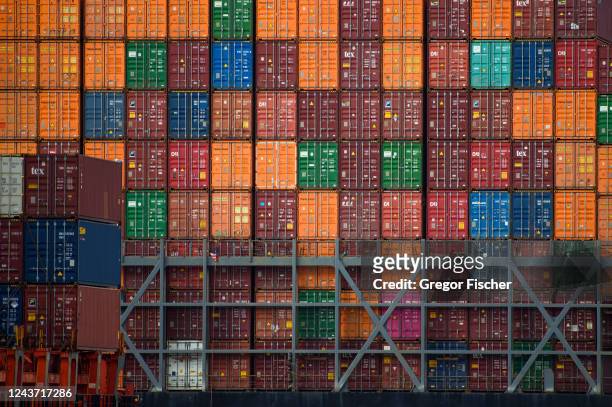 Shipping containers stand stacked at Hamburg Port on October 3, 2022 in Hamburg, Germany. The German economy, and German industry in particular, are...