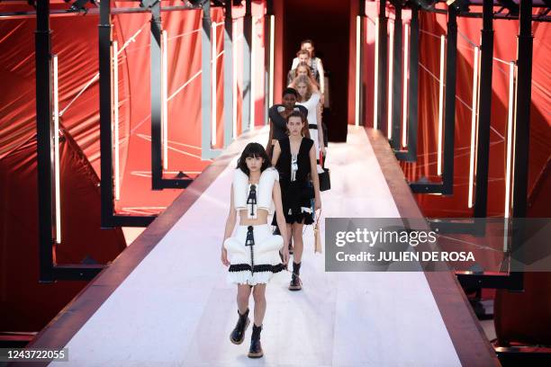 Models present creations for Louis Vuitton during the Spring-Summer 2023 fashion show as part of the Paris Womenswear Fashion Week, in Paris on...