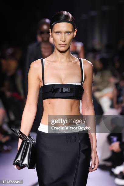 Bella Hadid walks the runway during the Miu Miu Womenswear Spring/Summer 2023 show as part of Paris Fashion Week on October 4, 2022 in Paris, France.