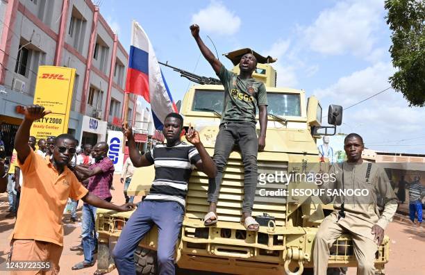 Protesters demonstrate agaisnt France and the Economic Community of West African States whose representatives are expected today in Ouagadougou on...