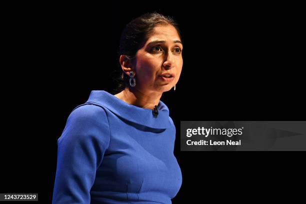 Home Secretary Suella Braverman addresses the Conservative Party Conference at the ICC on October 4, 2022 in Birmingham, England. This year the...