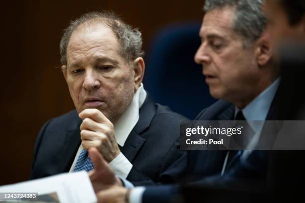 Former film producer Harvey Weinstein interacts with his attorney Mark Werksman in court at the Clara Shortridge Foltz Criminal Justice Center on...