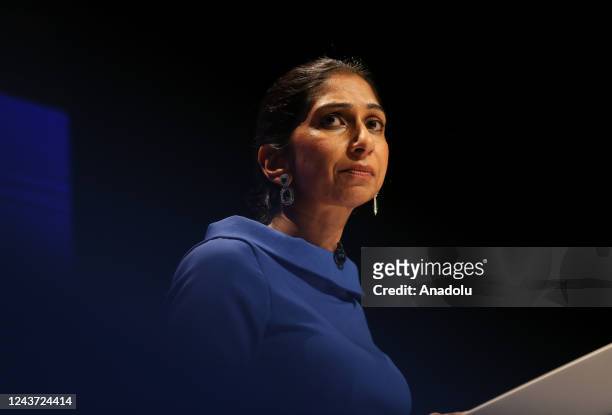 Home Secretary Suella Braverman delivers her speech during the Conservative Party's annual conference at the International Convention Centre in...