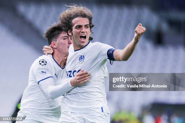 Matteo Guendouzi of Marseille celebrates a goal with his teammate Leonardo Balerdi during the UEFA Champions League group D match between Olympique...