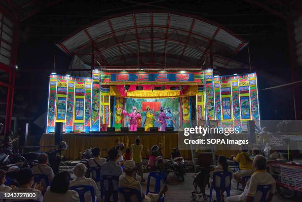 Members of the Chinese opera troupe perform at the Chow Sue Kong shrine during the annual vegetarian festival in Bangkok. The festival runs from 25...