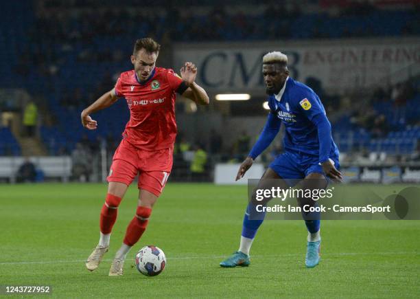 Blackburn Rovers' Ryan Hedges gets away from Cardiff City's Niels Nkounkou during the Sky Bet Championship between Cardiff City and Blackburn Rovers...