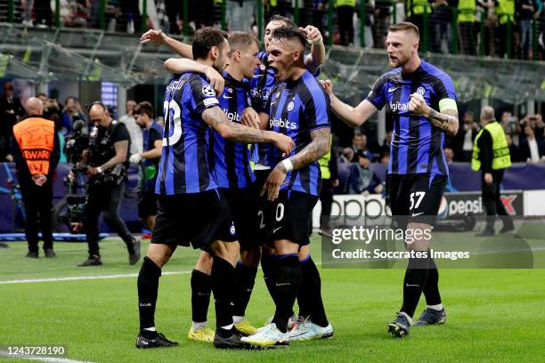 Hakan Calhanoglu of FC Internazionale celebrates during the UEFA Champions League match between Internazionale v FC Barcelona at the San Siro on...