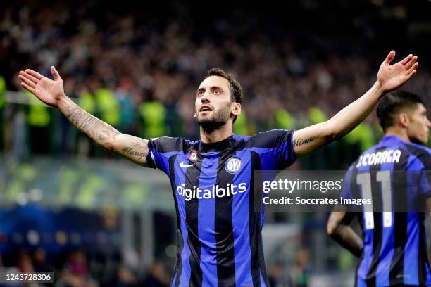 Hakan Calhanoglu of FC Internazionale celebrates 1-0 during the UEFA Champions League match between Internazionale v FC Barcelona at the San Siro on...