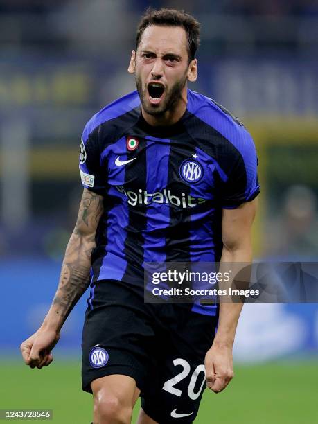 Hakan Calhanoglu of FC Internazionale celebrates 1-0 during the UEFA Champions League match between Internazionale v FC Barcelona at the San Siro on...