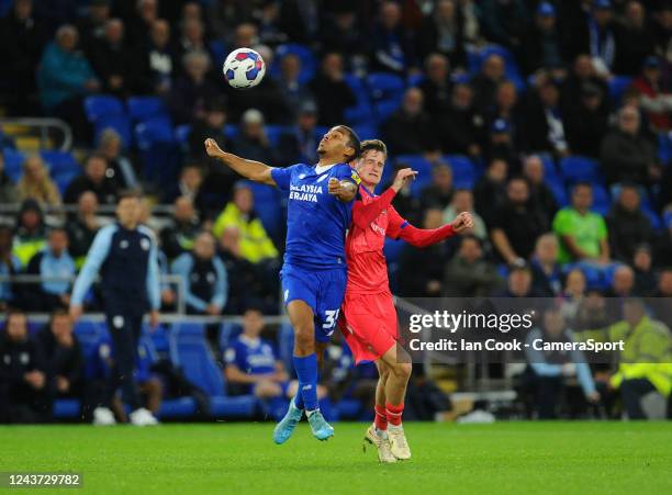 Cardiff City's Cedric Kipre battles with Blackburn Rovers' Tyler Morton during the Sky Bet Championship between Cardiff City and Blackburn Rovers at...