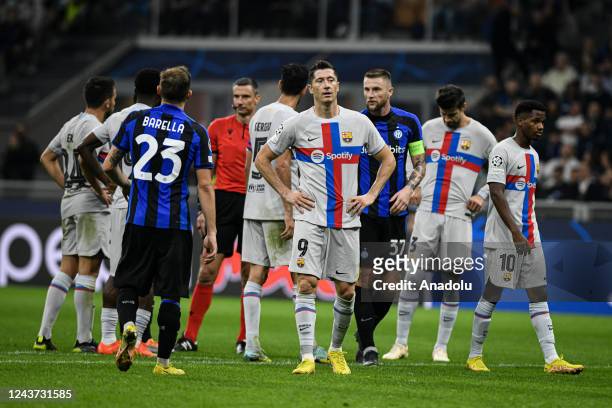 Robert Lewandowski of FC Barcelona and Milan Skriniar of FC Internazionale are seen during the UEFA Champions League match between FC Internazionale...