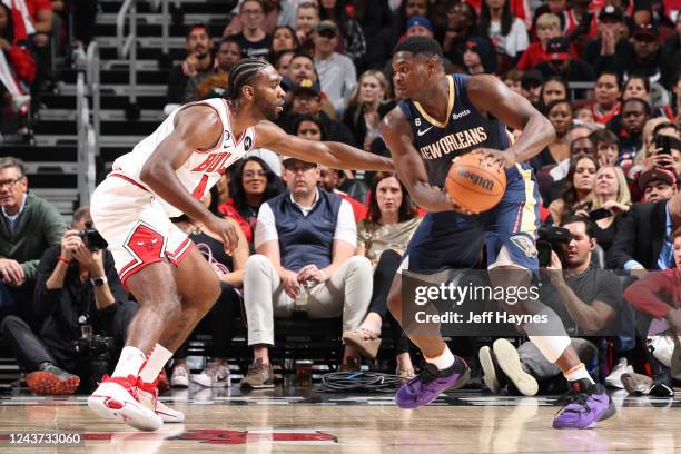 Patrick Williams of the Chicago Bulls plays defense on Zion Williamson of the New Orleans Pelicans during the game on October 4, 2022 at United...