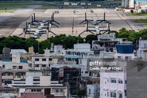 This picture taken on August 23, 2022 shows a general view of the US Marine Corps Air Station Futenma from Kakazutakadai Park in Ginowan, Okinawa...