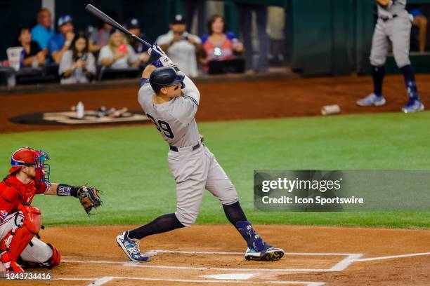 New York Yankees center fielder Aaron Judge hits his 62nd home run to beat the Roger Maris home run record during the game between the Texas Rangers...