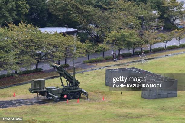 This picture shows a Japan Air Self-Defense Force ground-based missile interceptor Patriot system deployed next to the Ministry of Defense in Tokyo...