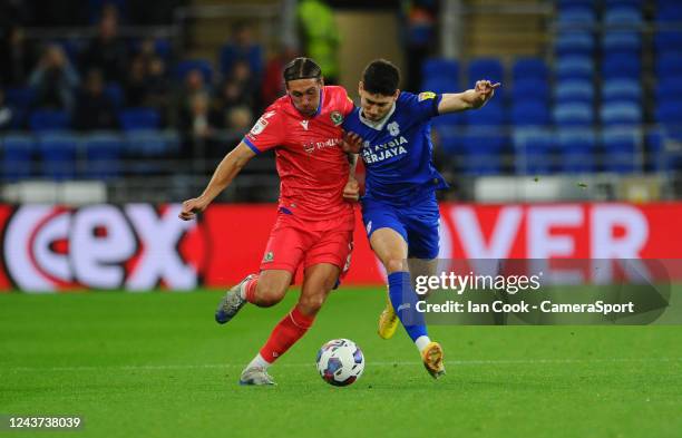 Blackburn Rovers' Callum Brittain battles with Cardiff City's Callum O'Dowda during the Sky Bet Championship between Cardiff City and Blackburn...