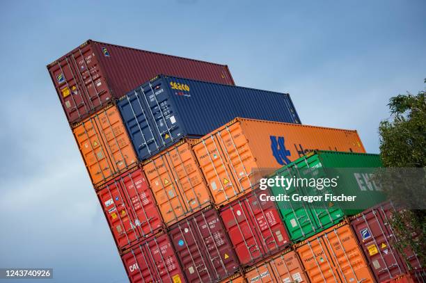 Shipping containers stand stacked at Hamburg Port on October 5, 2022 in Hamburg, Germany. The German economy, and German industry in particular, are...