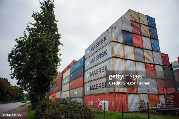 Shipping containers stand stacked at Hamburg Port on October 5, 2022 in Hamburg, Germany. The German economy, and German industry in particular, are...