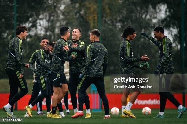 Diogo Dalot of Manchester United reacts during a Manchester United training session at at Carrington Training Ground on October 5, 2022 in...