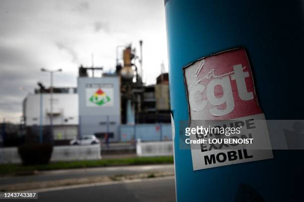 Photograph shows a CGT trade union's sticker during a protest for better wages in front of the ExxonMobil site, in Port-Jerome-sur-Seine, near Le...