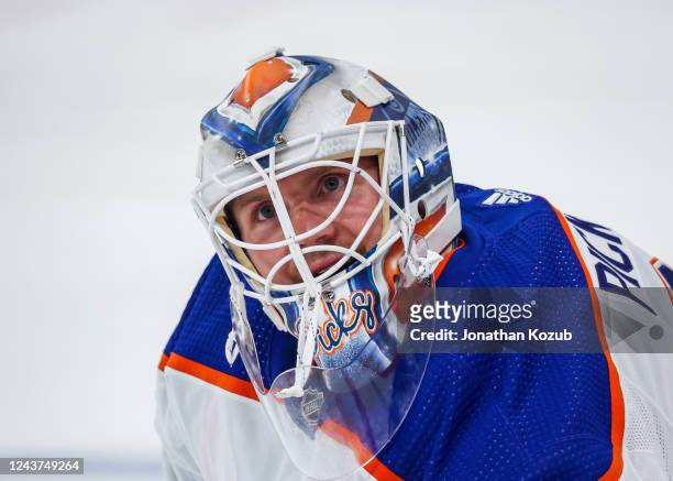 Goaltender Calvin Pickard of the Edmonton Oilers looks on during the pre-game warm up prior to NHL pre-season action against the Winnipeg Jets at...