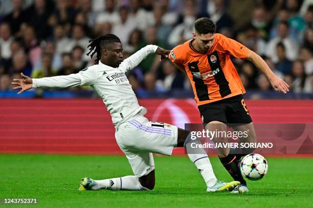 Real Madrid's French midfielder Eduardo Camavinga vies with Shakhtar Donetsk Ukranian midfielder Georgiy Sudakov during the UEFA Champions League 1st...