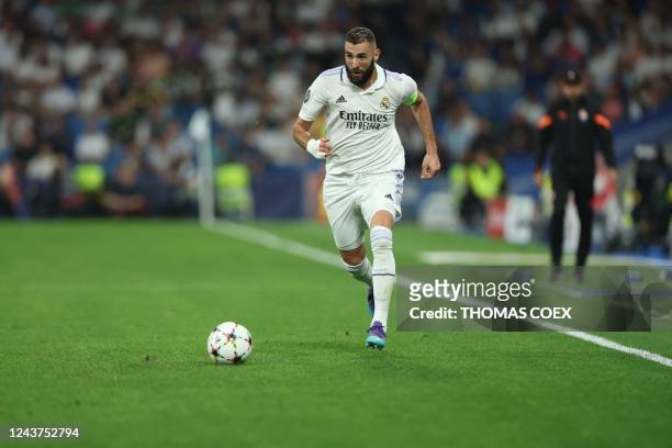Real Madrid's French forward Karim Benzema controls the ball during the UEFA Champions League 1st round day 3 group F football match between Real...