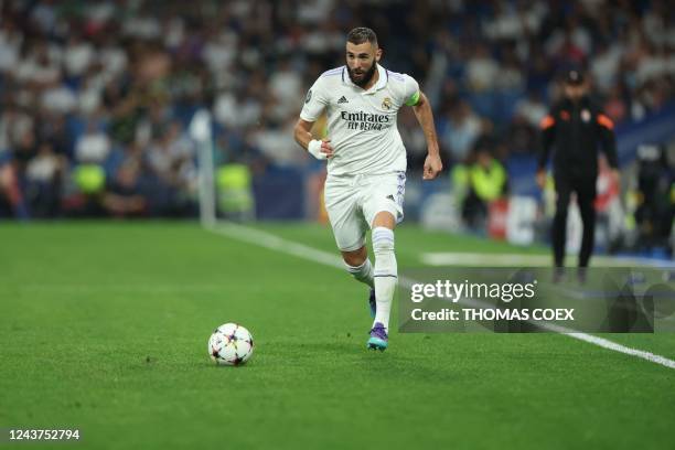 Real Madrid's French forward Karim Benzema controls the ball during the UEFA Champions League 1st round day 3 group F football match between Real...