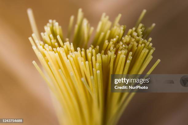 Dry spaghetti pasta is seen in this illustration photo taken in Krakow, Poland on October 5, 2022.