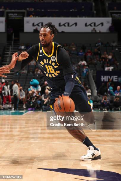 James Johnson of the Indiana Pacers drives to the basket during the game against the Charlotte Hornets on October 5, 2022 at Spectrum Center in...